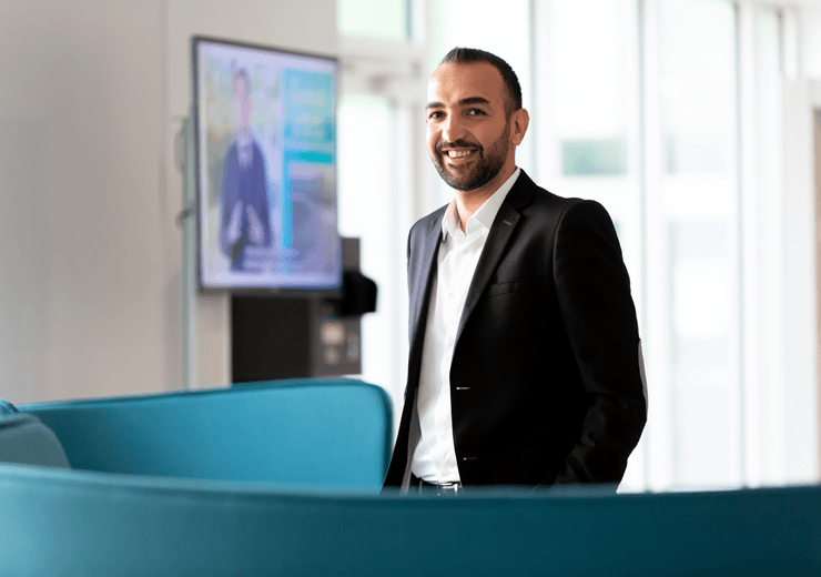 ©Studio Cabrelli Smiling Man In Company With Big Screen In Background HD 2