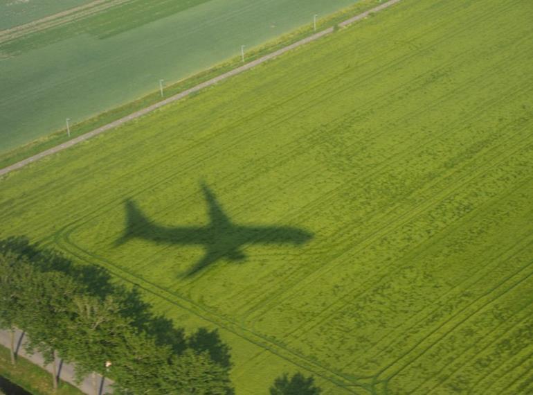 Green Plane Over Field Small Airport Blog