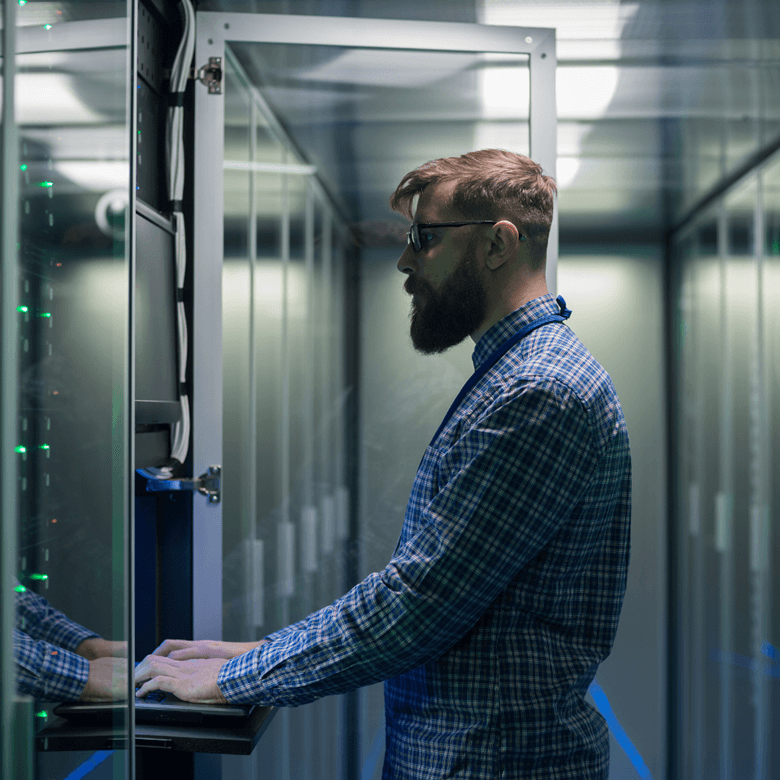 ©Adobstock Framestock Bearded IT Specialist Setting Servers In Data Center