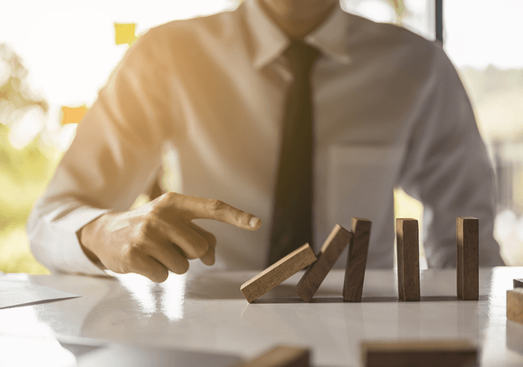 ©Adobstock Day Of Victory Businessman Pulling Or Placing Long Wooden Blocks In A Modern Office Indicates The Impact Or Management Risk Of The Business